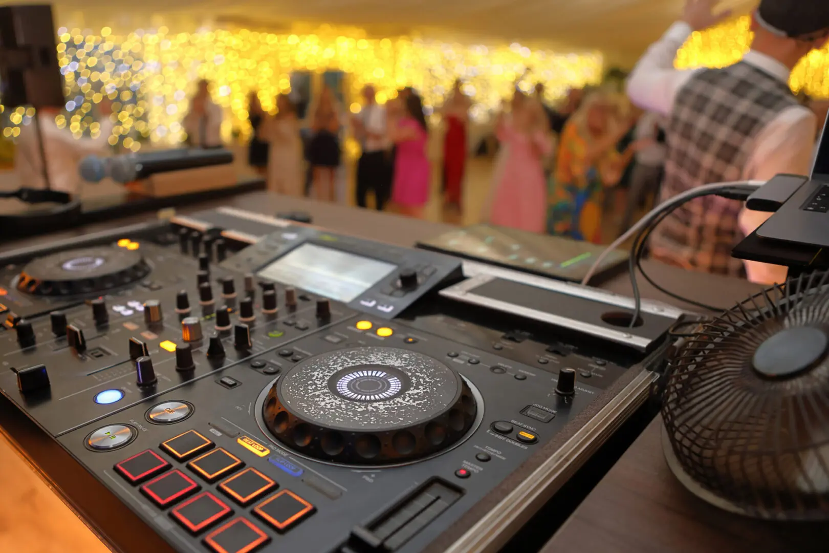 DJ equipment at a lively party event.